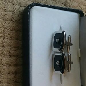 Sterling silver black cufflinks with a diamond stu